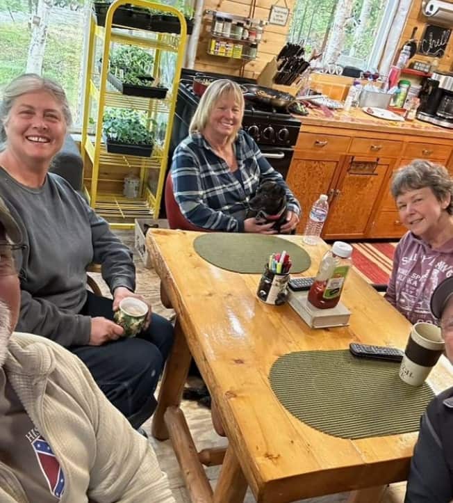 Image of Sue Aikens with her friends at the Kavik Camp