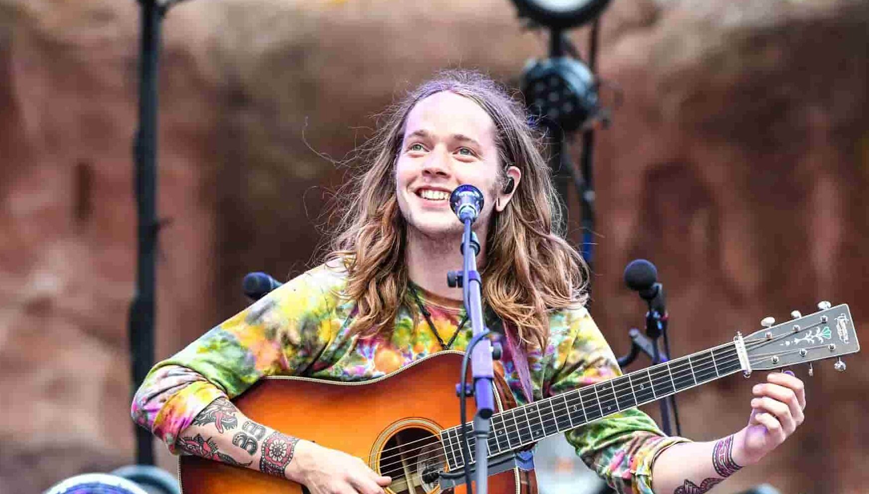 Image of Billy Strings as a singer amd his visible tattoos